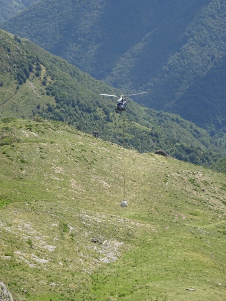Helicopter bringing supplies to the shepherds